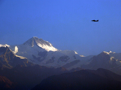 The pristine mountains of Nepal and an aeroplane